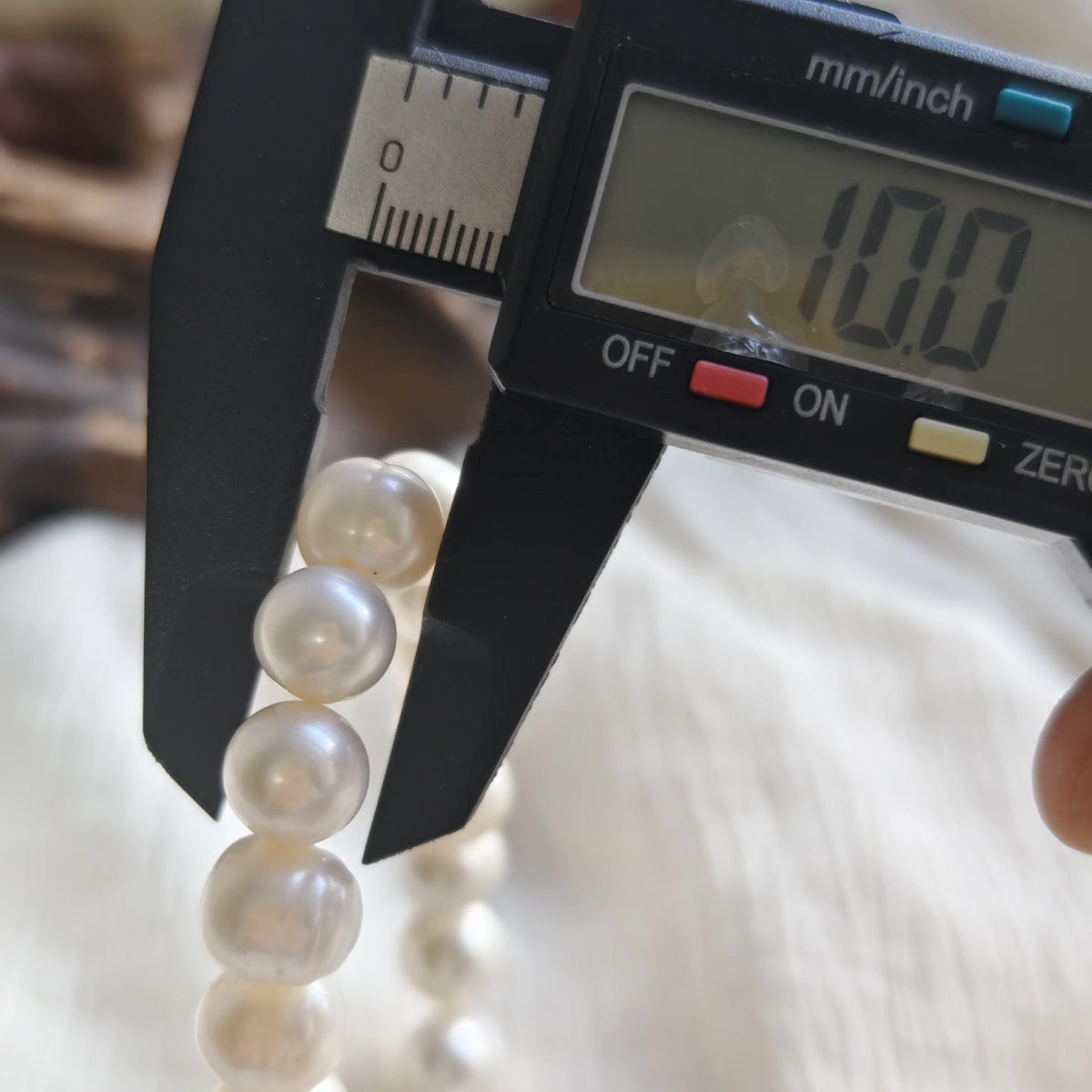 Armband med naturliga sötvattenspärlor 10mm