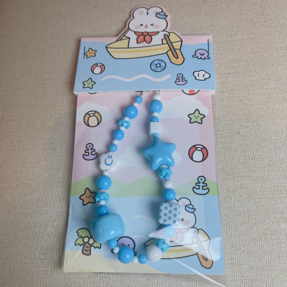 Handmade Beaded Phone Charm with Smiley Flowers