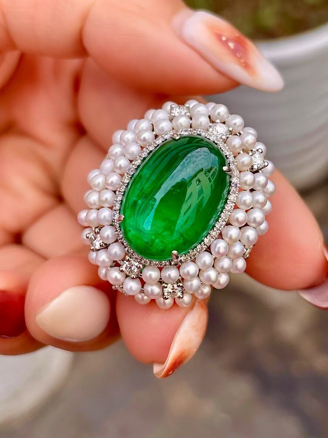18k Gold Ring with 11.8ct Cabochon Emerald, 0.71ct Diamond Halo, and Pearl Border