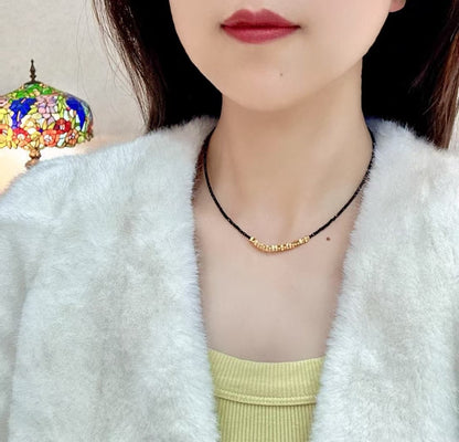 Black Gemstone Necklace with Gold Nugget Cluster