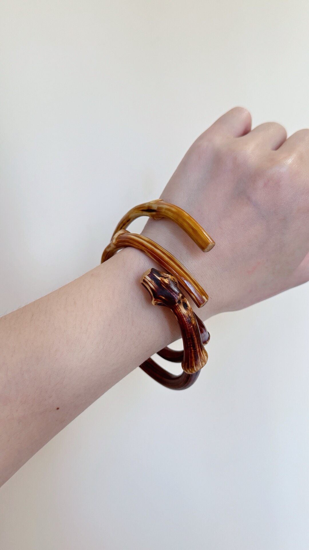 Sammanlänkade armband i rödvedsrot