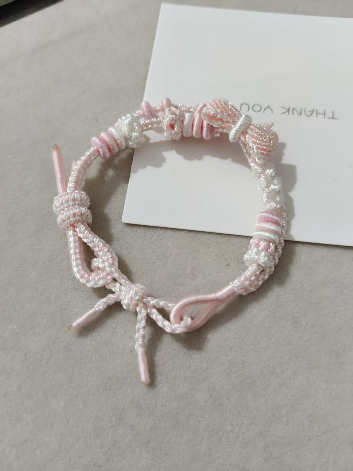 Handwoven Pink White Gradient Bracelet with Bow