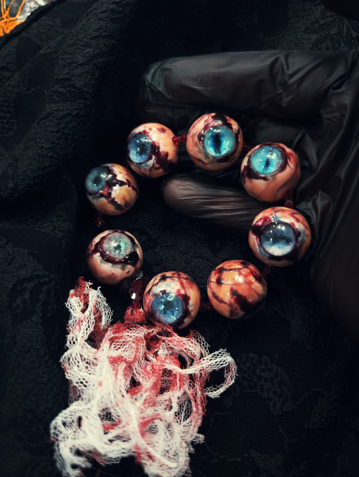 Cthulhu Eye Bead Bracelet Red Tassel