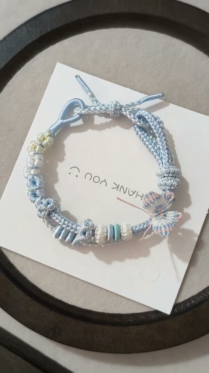Handwoven Light Blue Bracelet with Floral Decor
