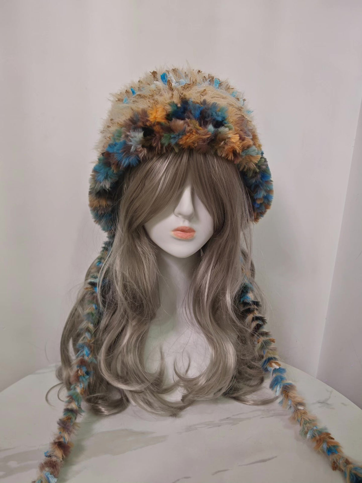 Faux Fur Hood with Braided Tassels