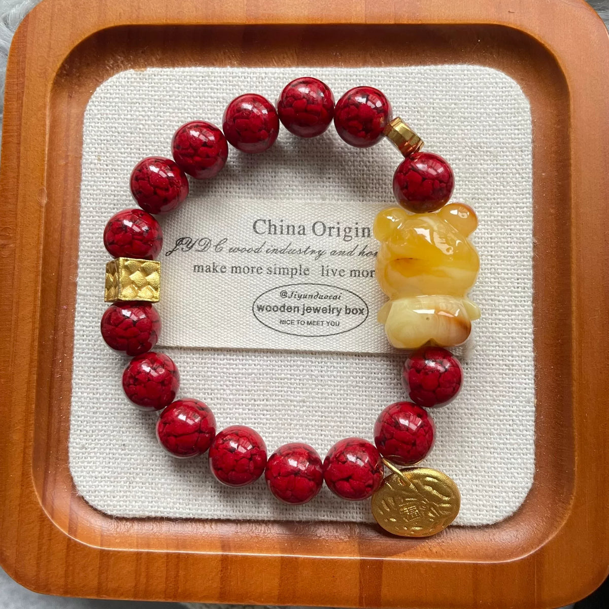 Pulsera con dije de oso en ambar de miel