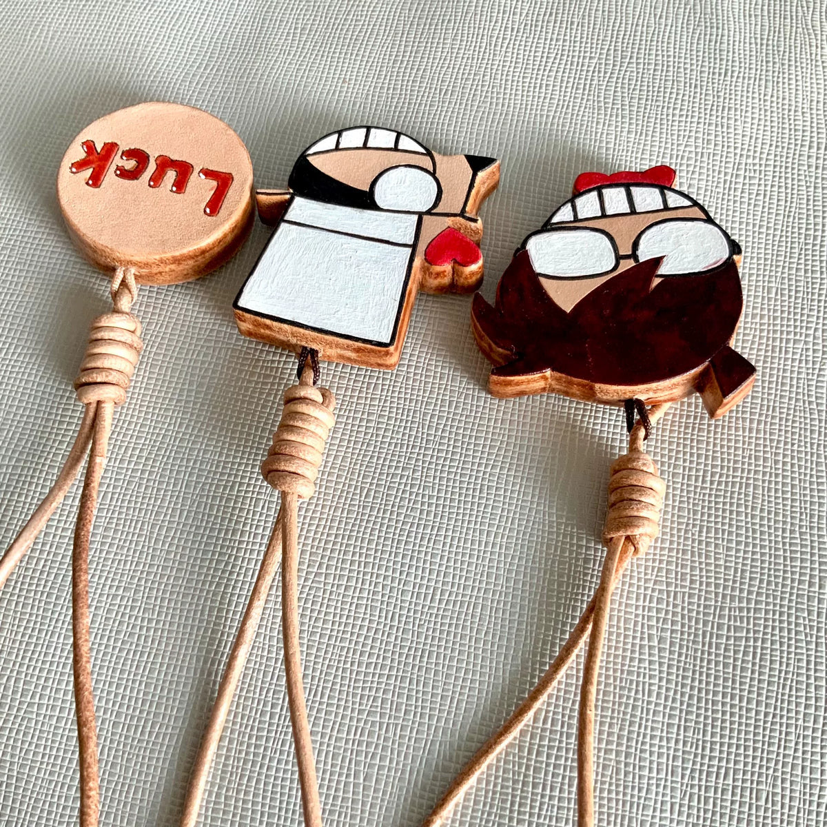 Set di charm in pelle artigianale anime