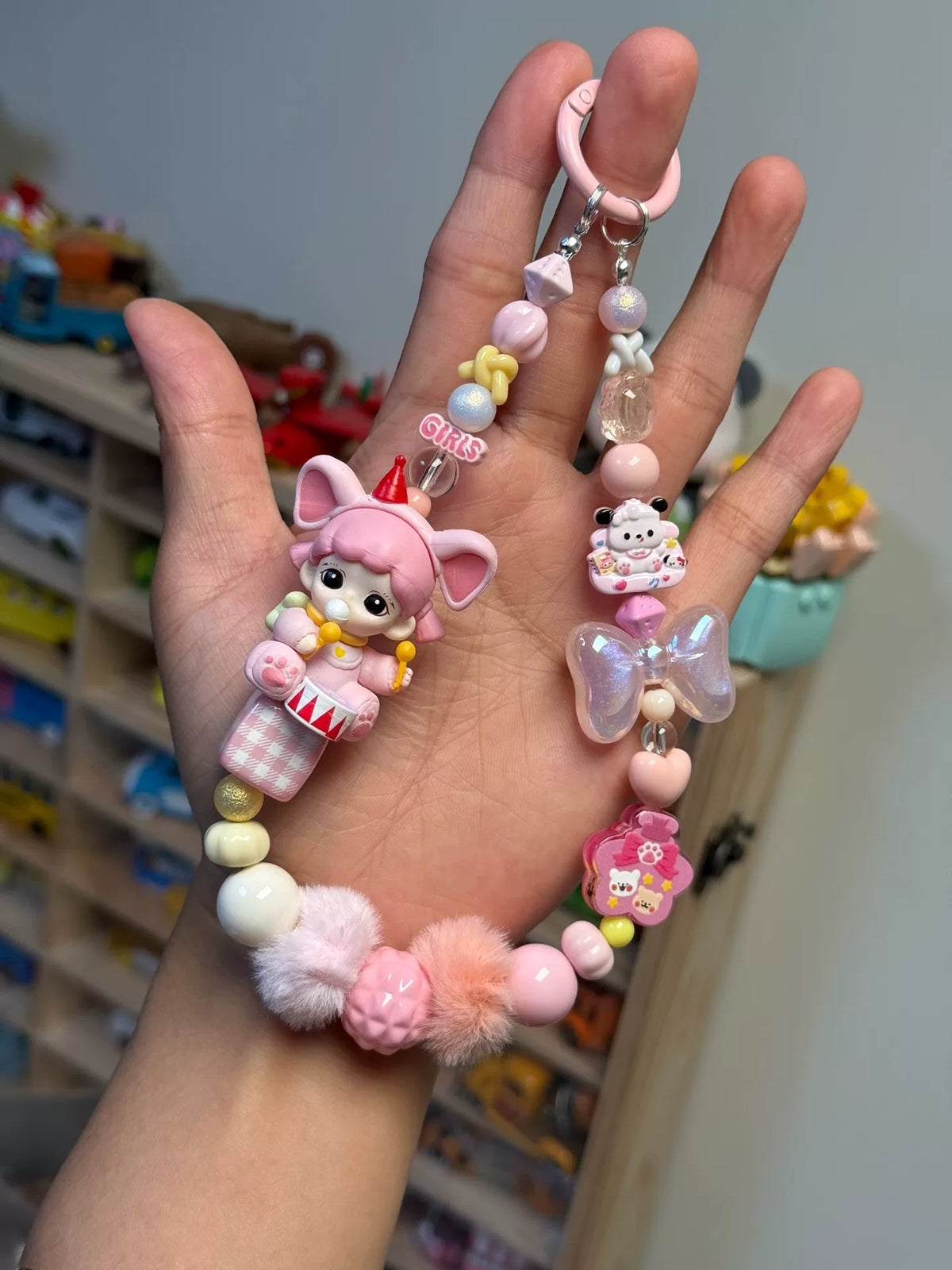 ピンクの人形スマホストラップ バッグチャーム キーホルダー