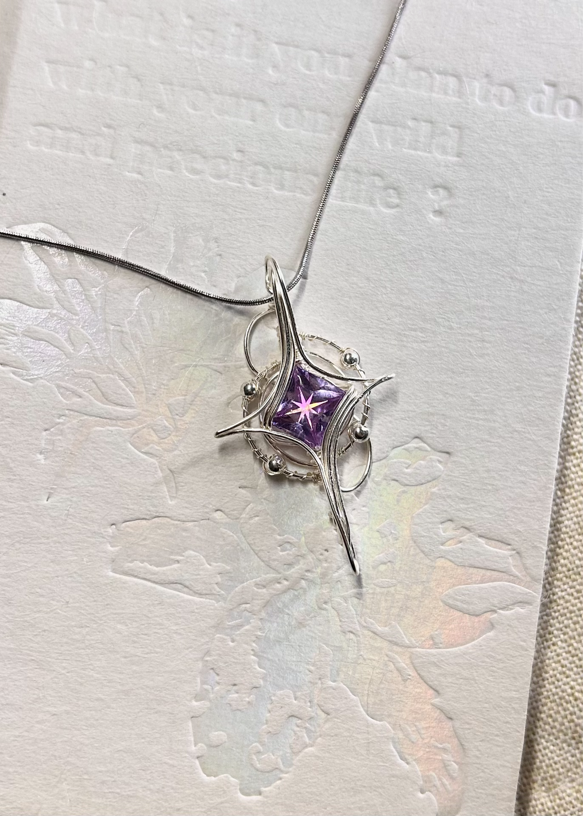 Wire Wrapped Purple Zircon Star Pendant