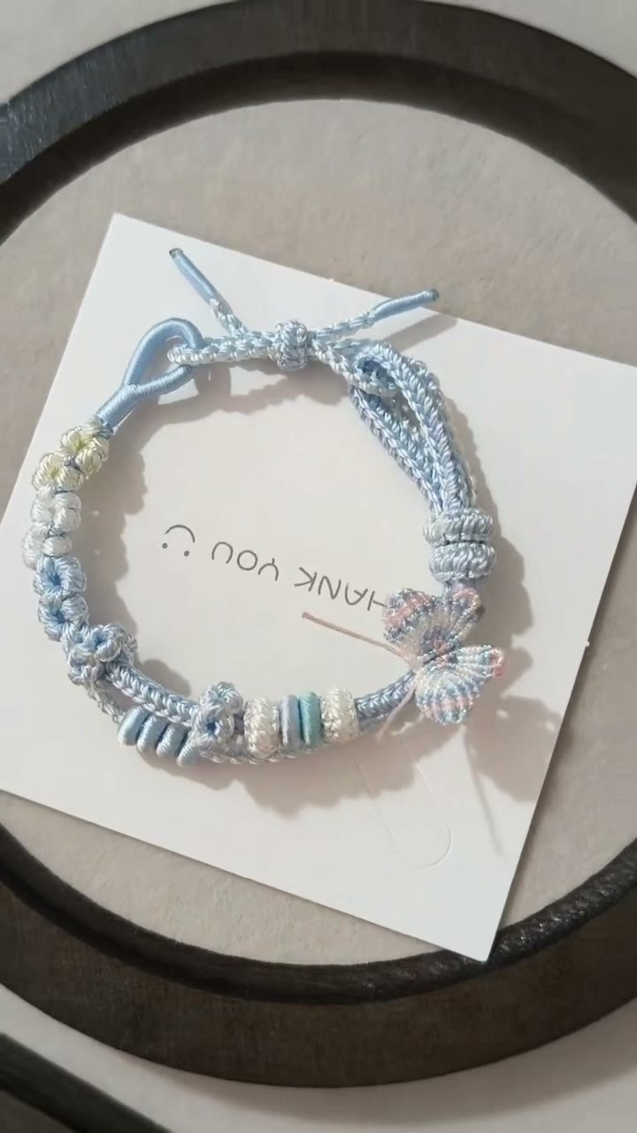 Handwoven Light Blue Bracelet with Floral Decor