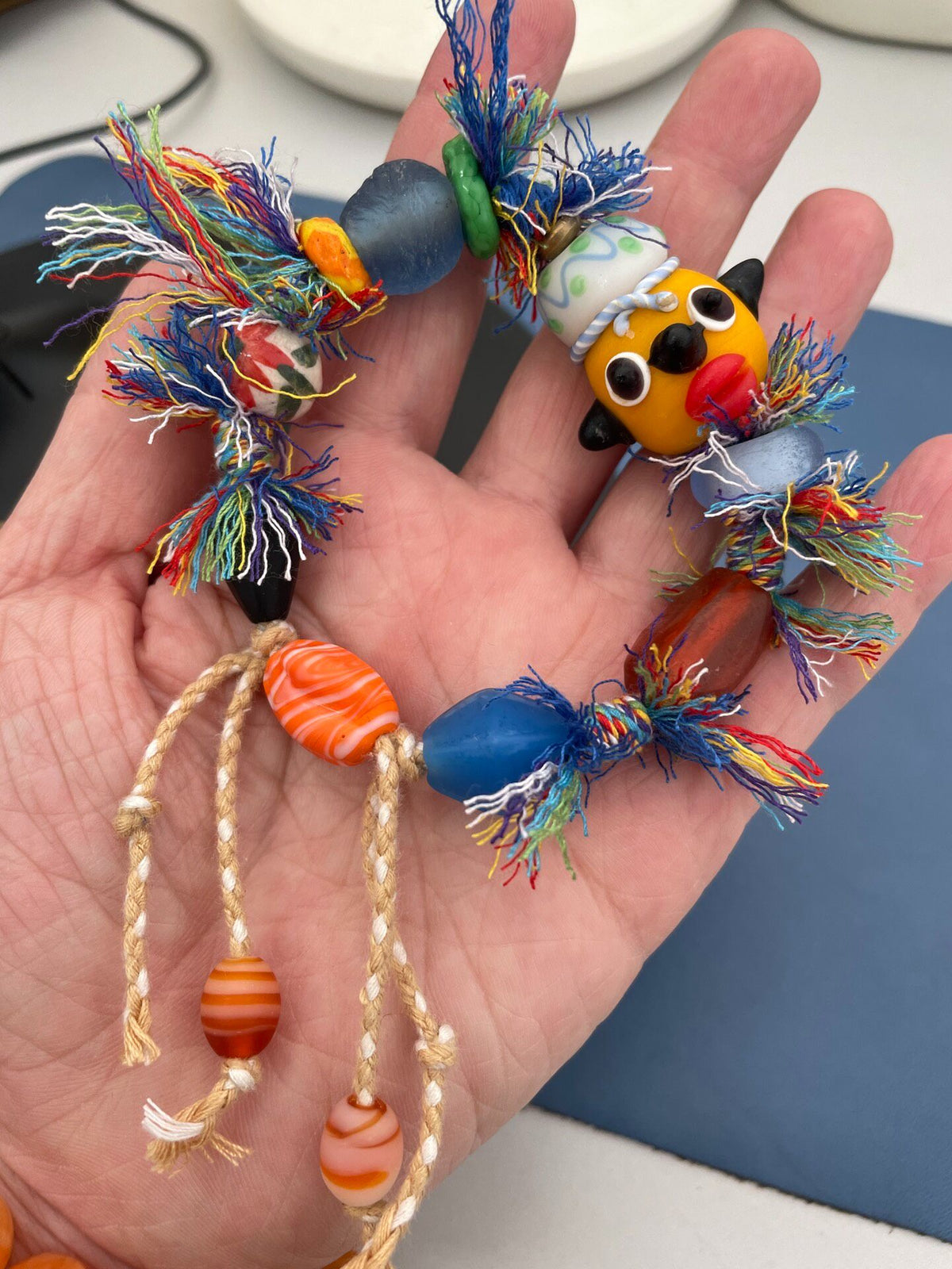 Handcrafted Glass Bead Bracelet With Yellow Doll Head