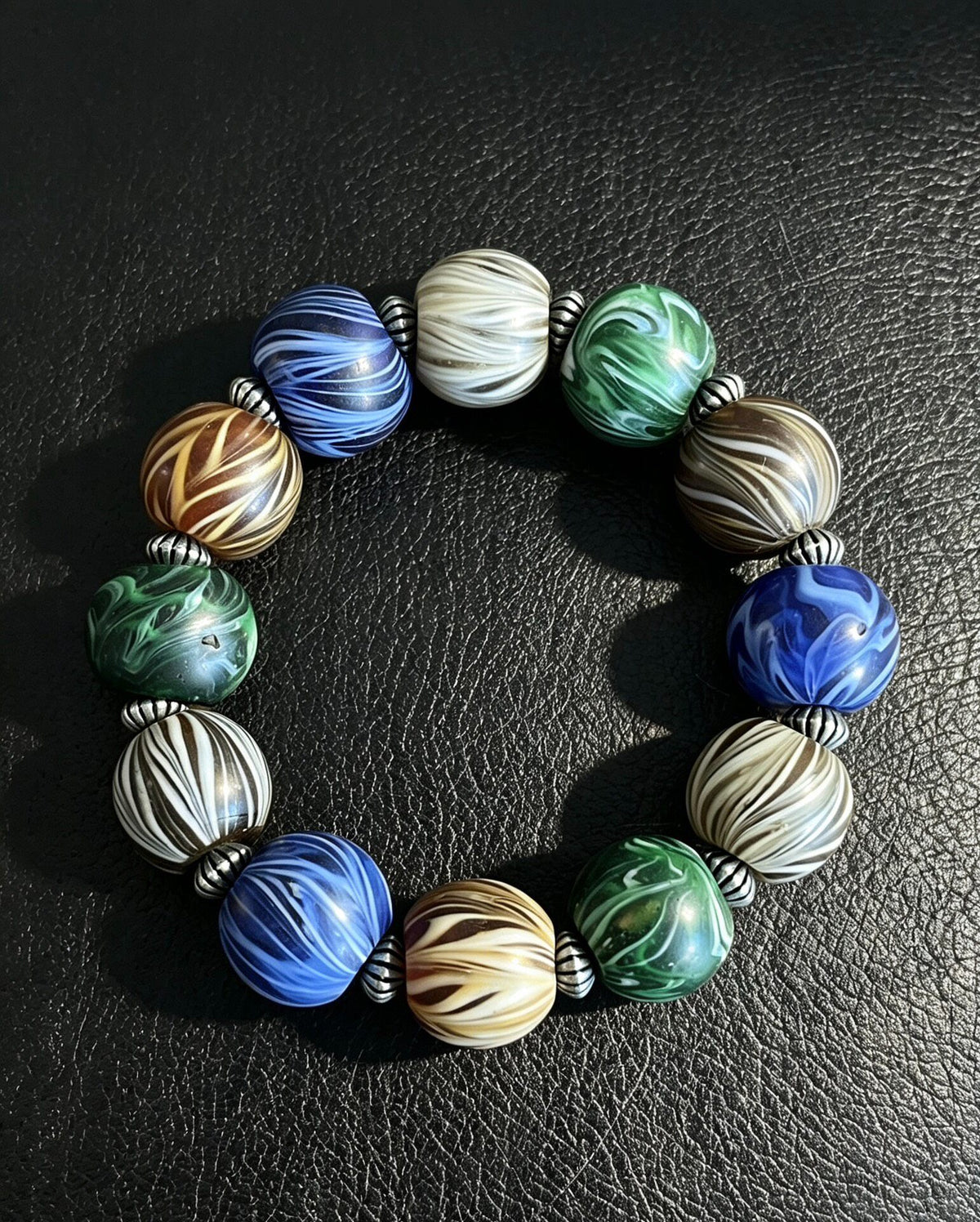 Multicolored Glass Bead Bracelet with Metal Spacers