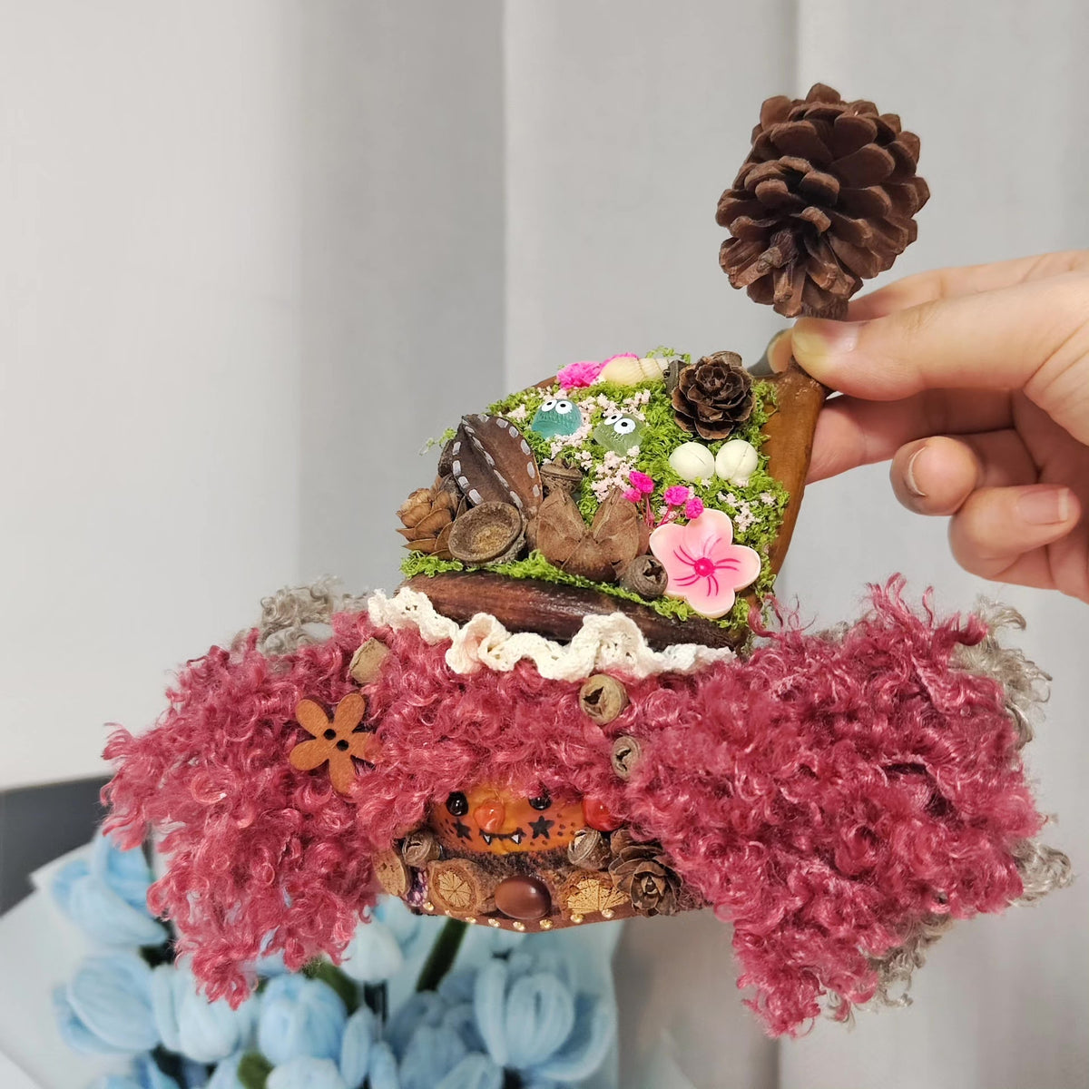 Double-Sided Handcrafted Figurine with Pinecone Bell