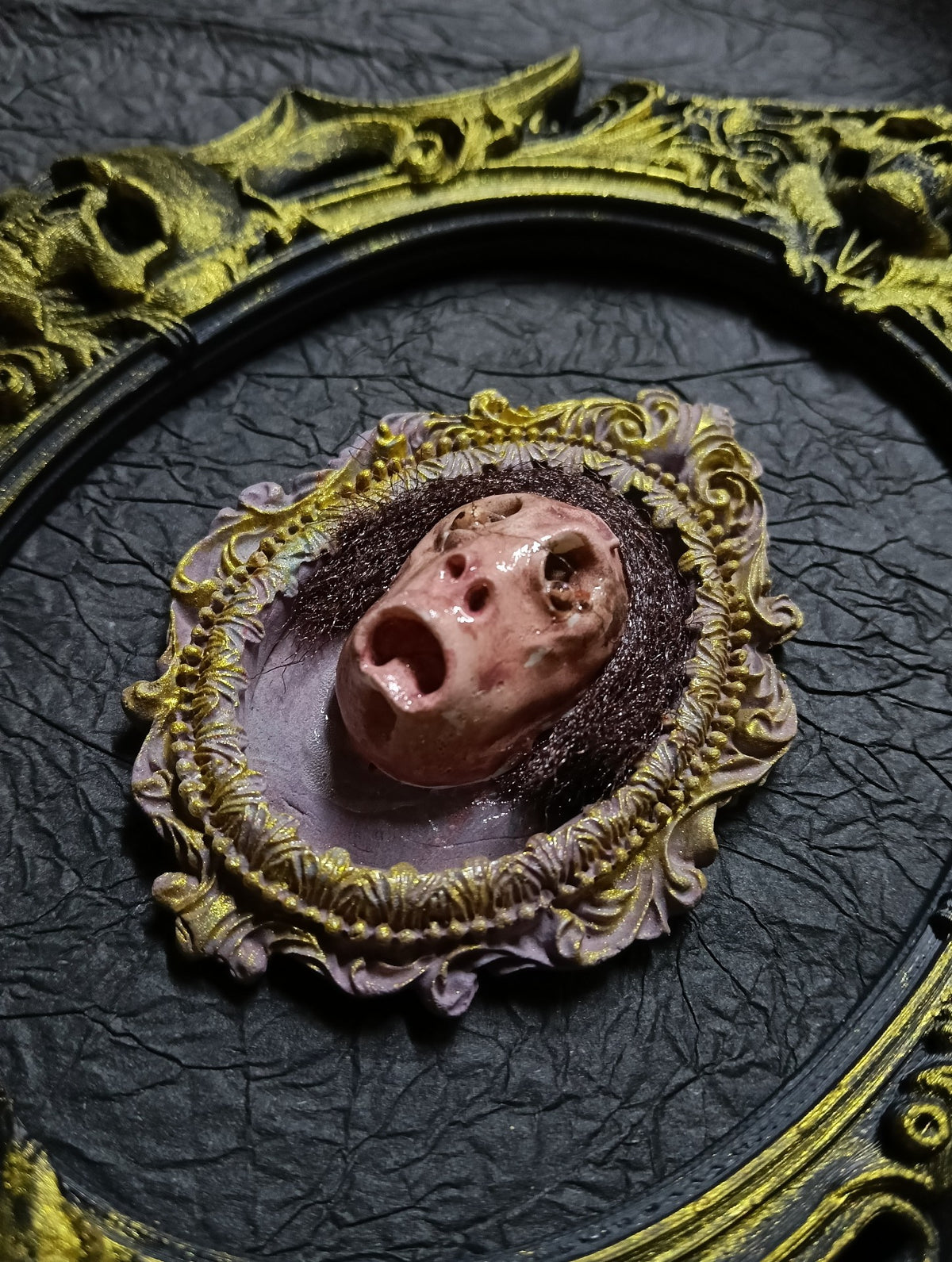 Gothic Sculpted Face Oval Frame Brooch
