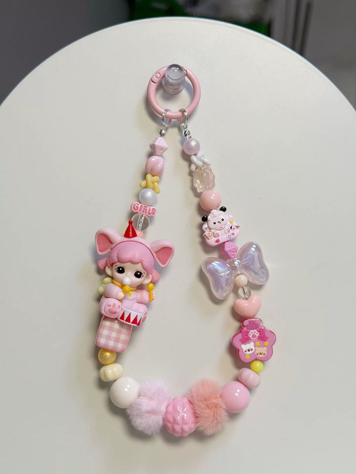 ピンクの人形スマホストラップ バッグチャーム キーホルダー