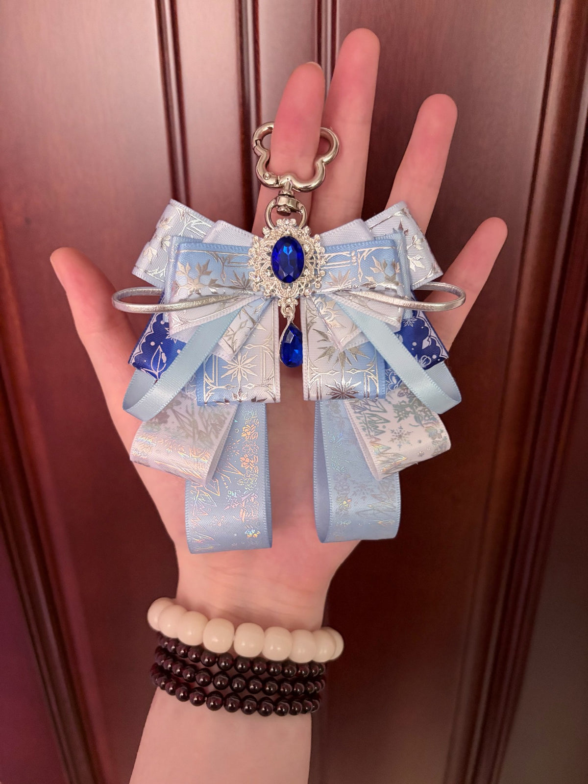 Light Blue Bow Keychain with Blue Gemstone