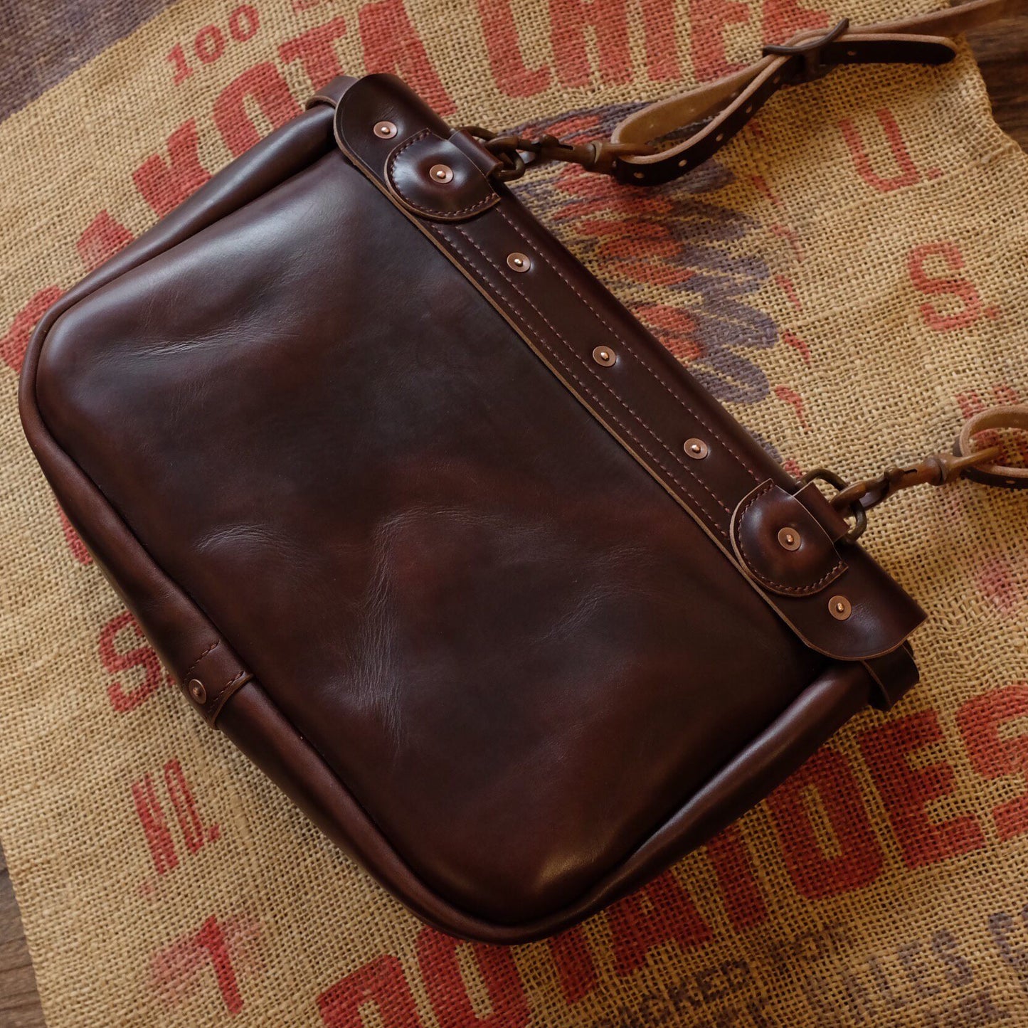 Rich Brown Leather Messenger Bag with Brass Buckle Closure
