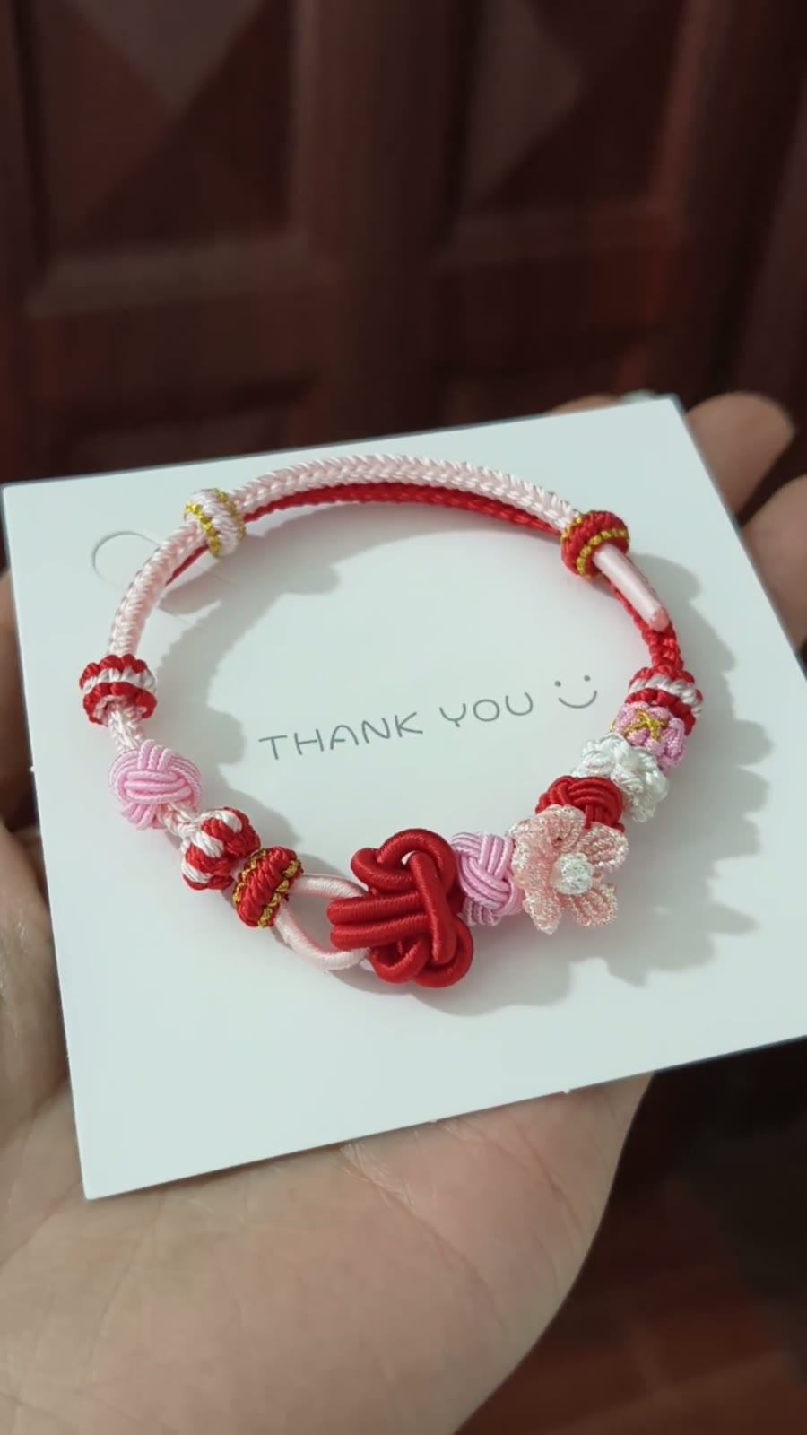 Pulsera de Nudo de Flor Roja y Rosa Trenzada a Mano