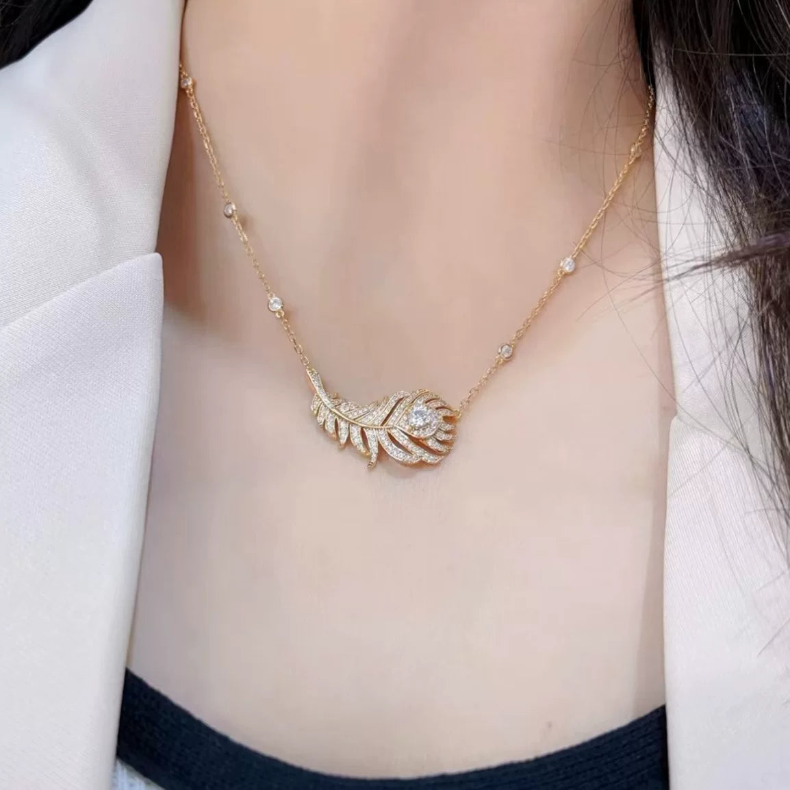 Colier plume en argent 925 plaqué or
