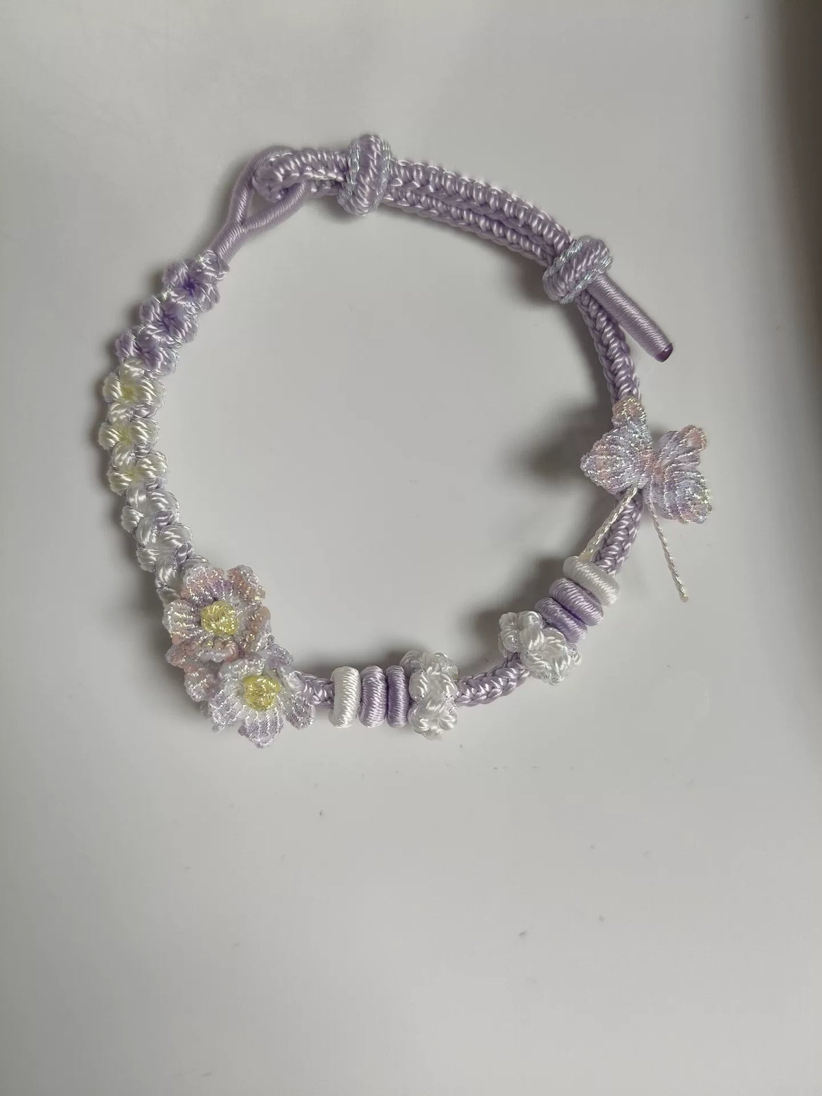 Handgemaakt geweven armband paars wit verloop