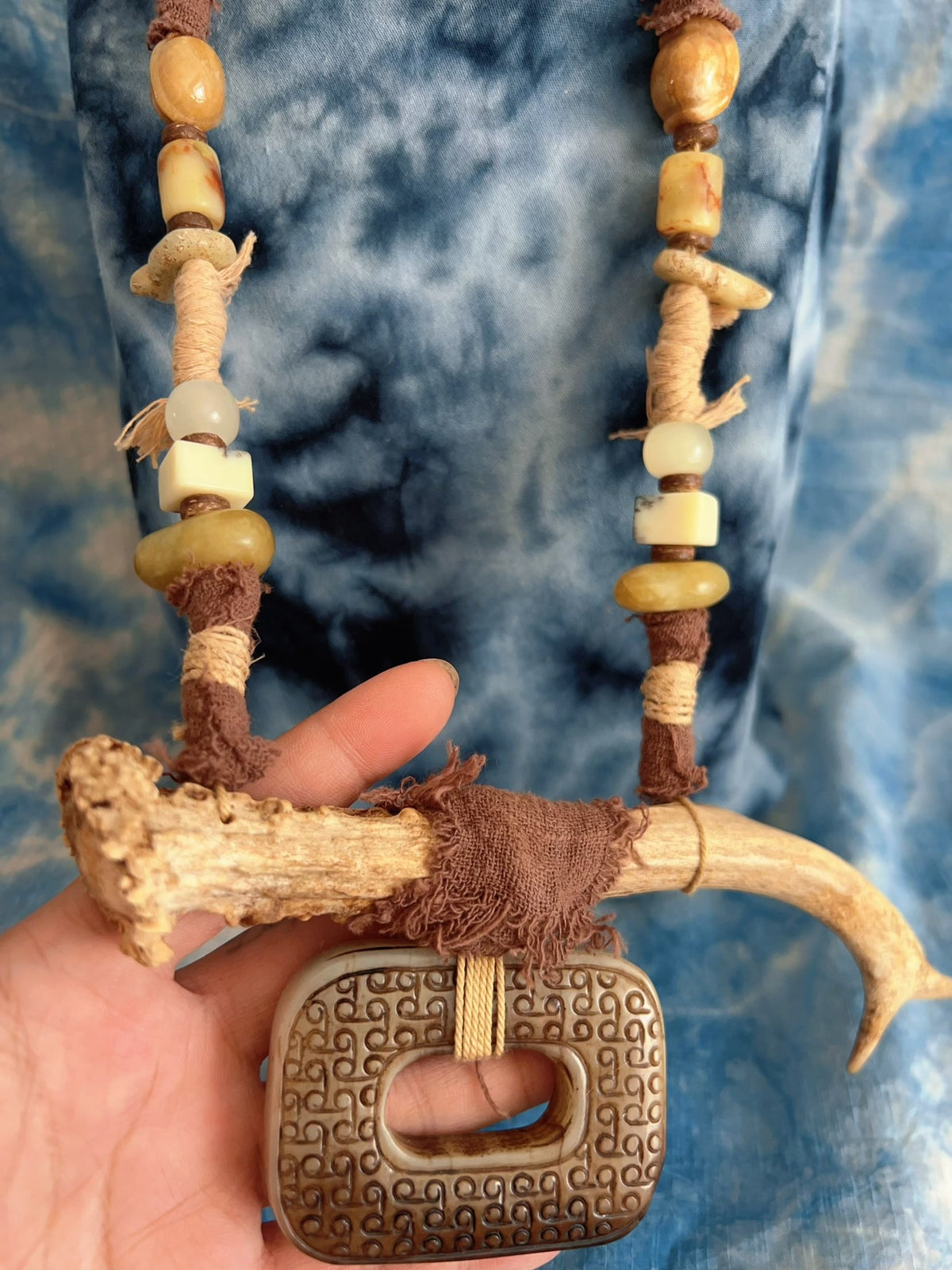 Handwoven Antler Necklace with Carved Stone Pendant