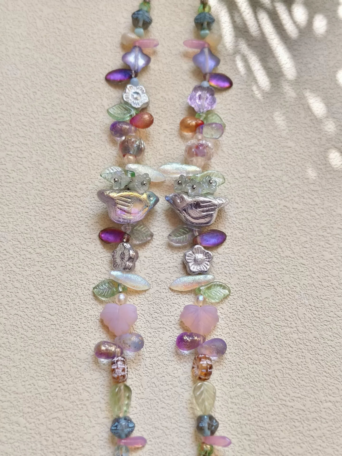 Bracelet oiseau en verre tchèque violet et or