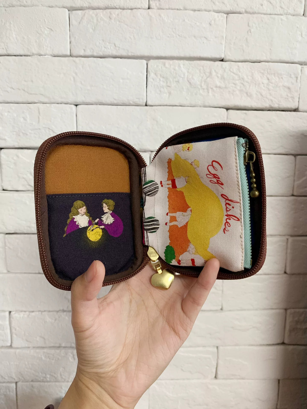 Estuche de tejido Oxford con cremallera y tirador de corazón