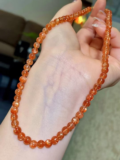 18k Gold Clasp Orange Bead Necklace with Golden Needle Inclusions 5.5-6mm