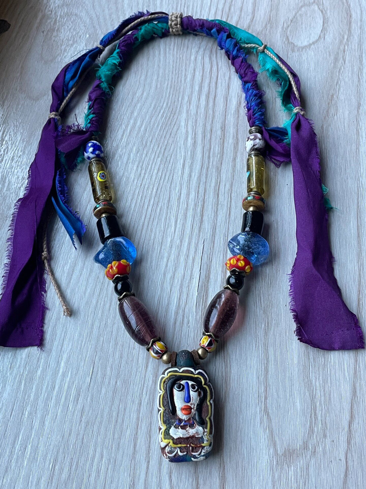 Phoenician Doll Glass Pendant Necklace