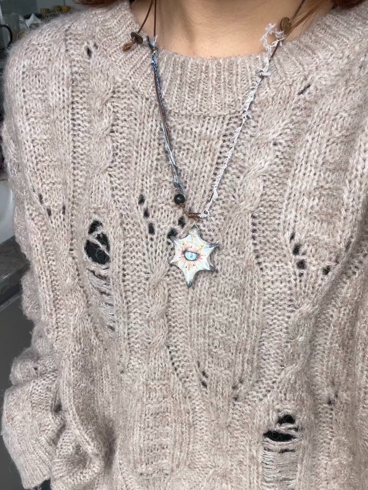 Collar artesanal de arcilla con estrella y piedra de ágata