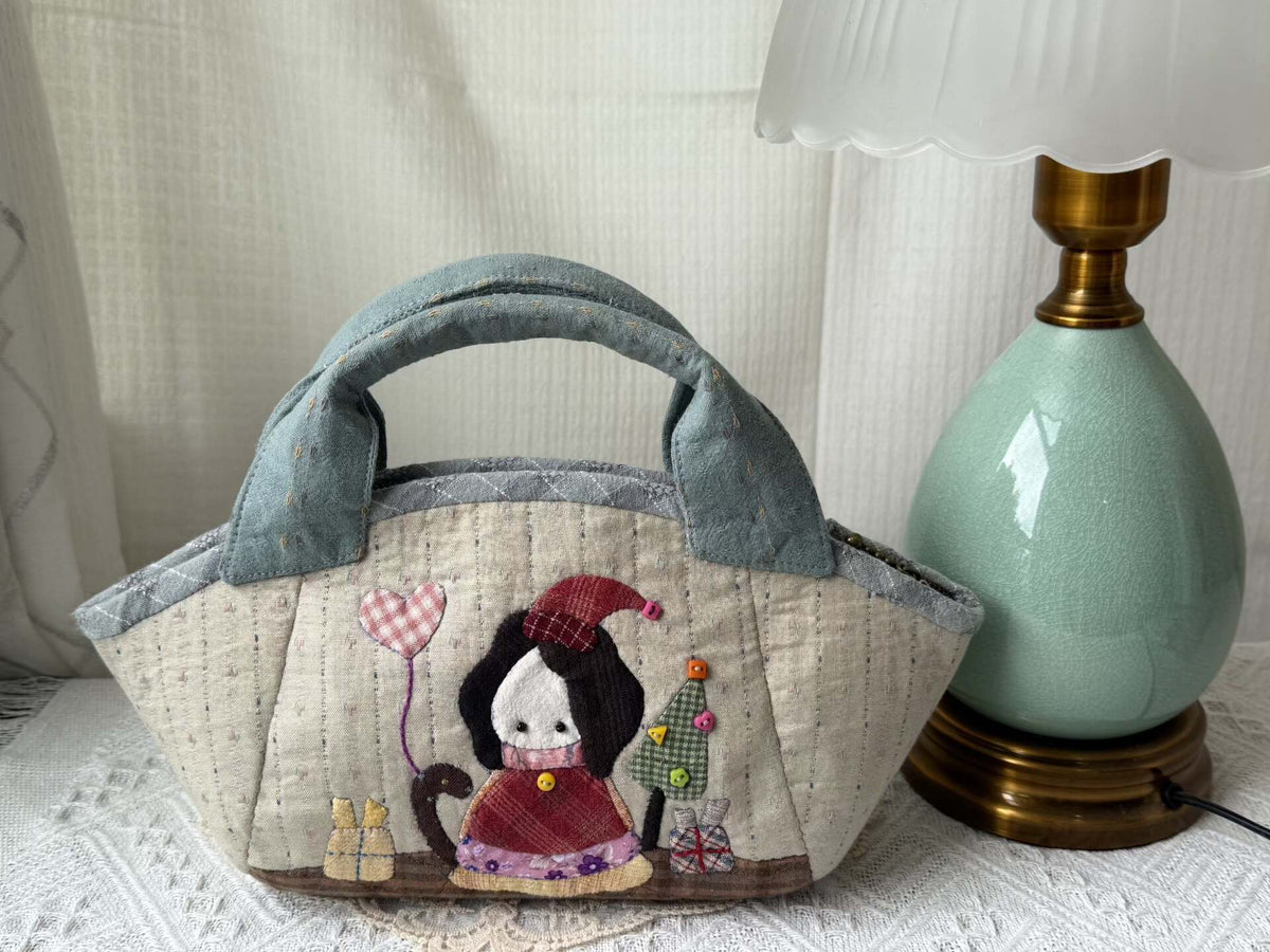 Handgjordad patchwork-väska med djurapplikation