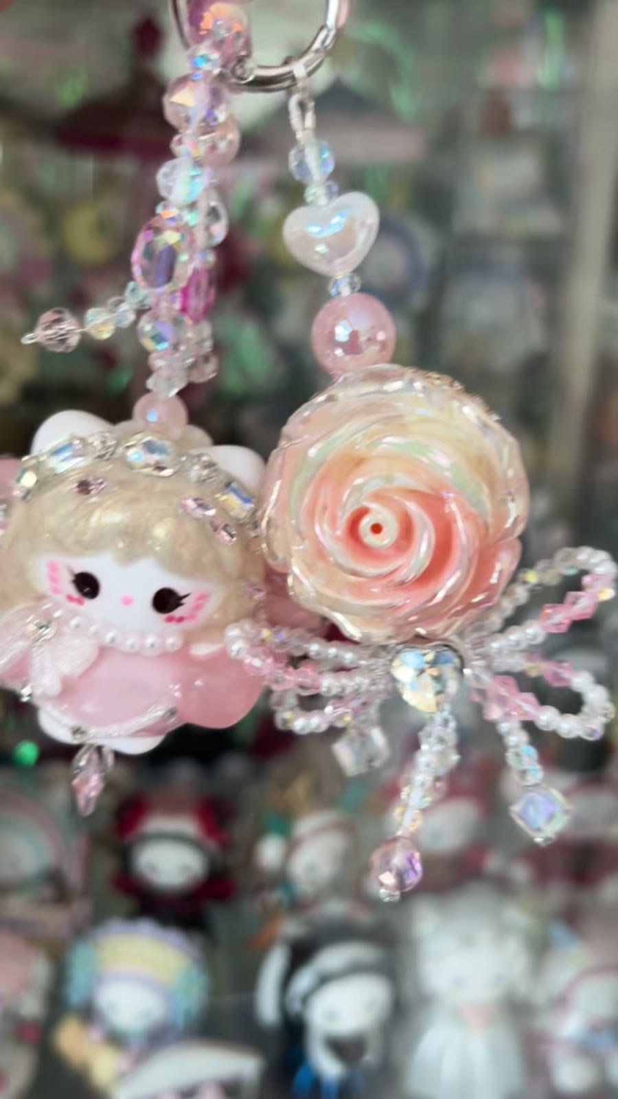 Roze Kraalpop Telefoonhanger met Strass Roos