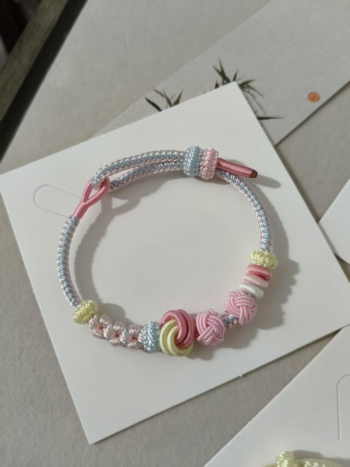 Handwoven Pink Blue Knot Bracelet
