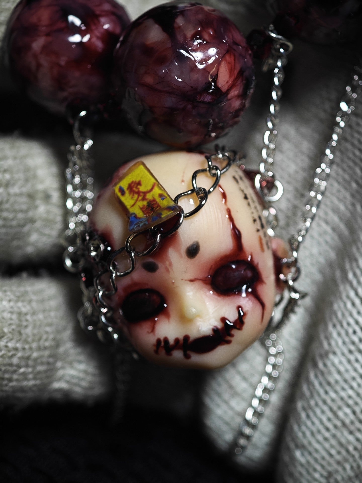 Handcrafted Doll Head Pendant with Eye Beads and Chain