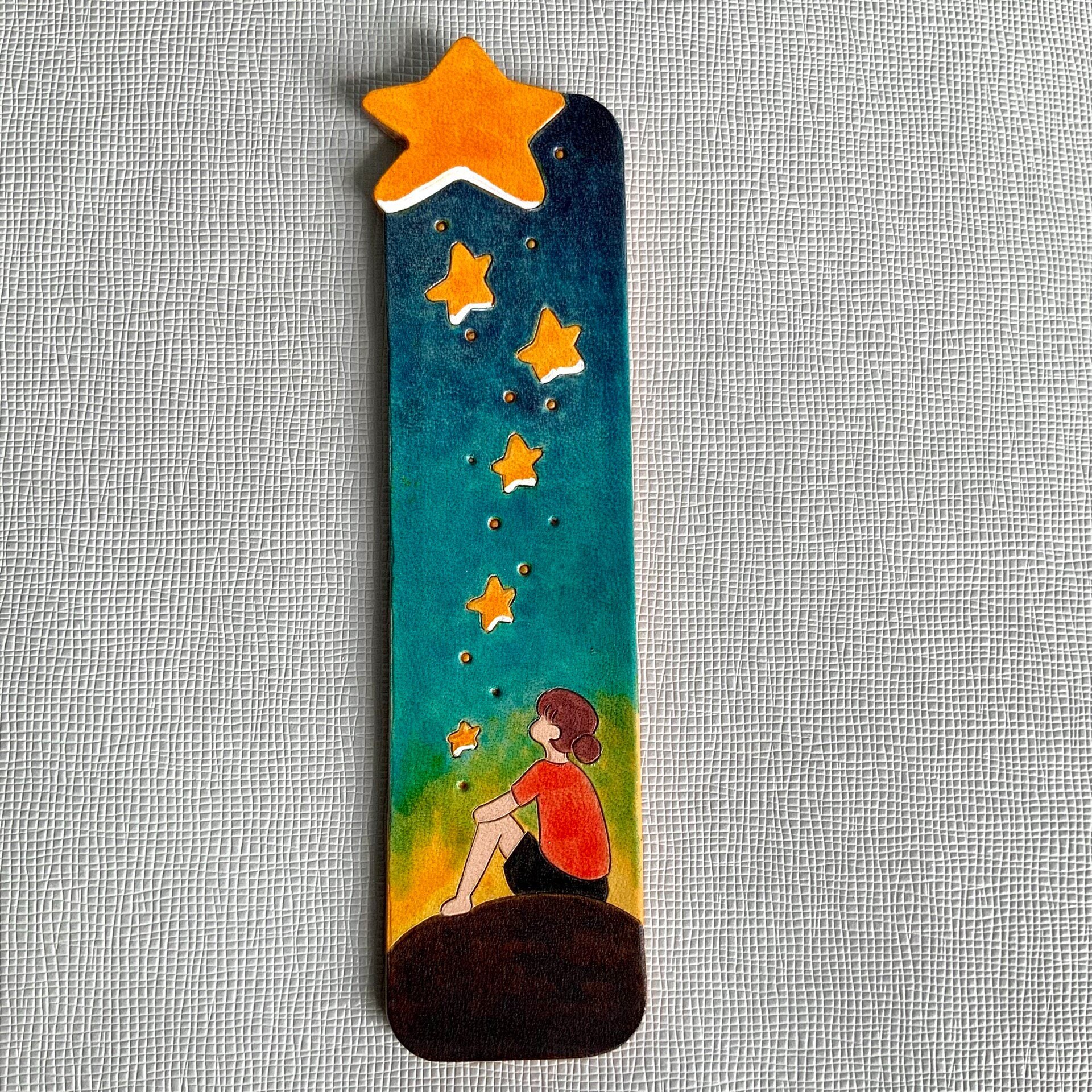 Hand-Painted Leather Bookmark with Star Cutouts
