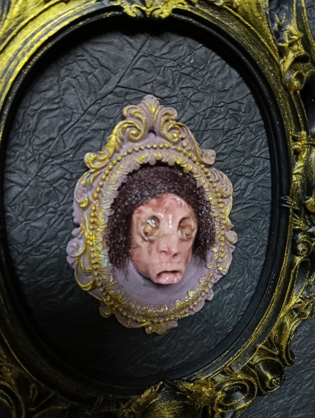 Gothic Sculpted Face Oval Frame Brooch