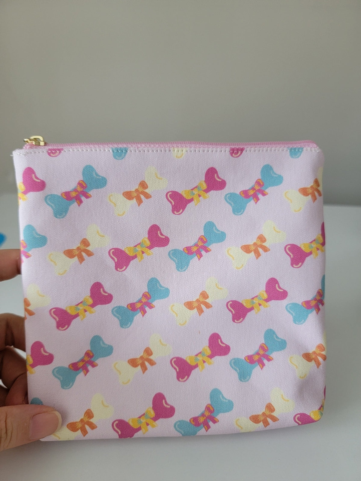 Bone Print Bow Zipper Pouch