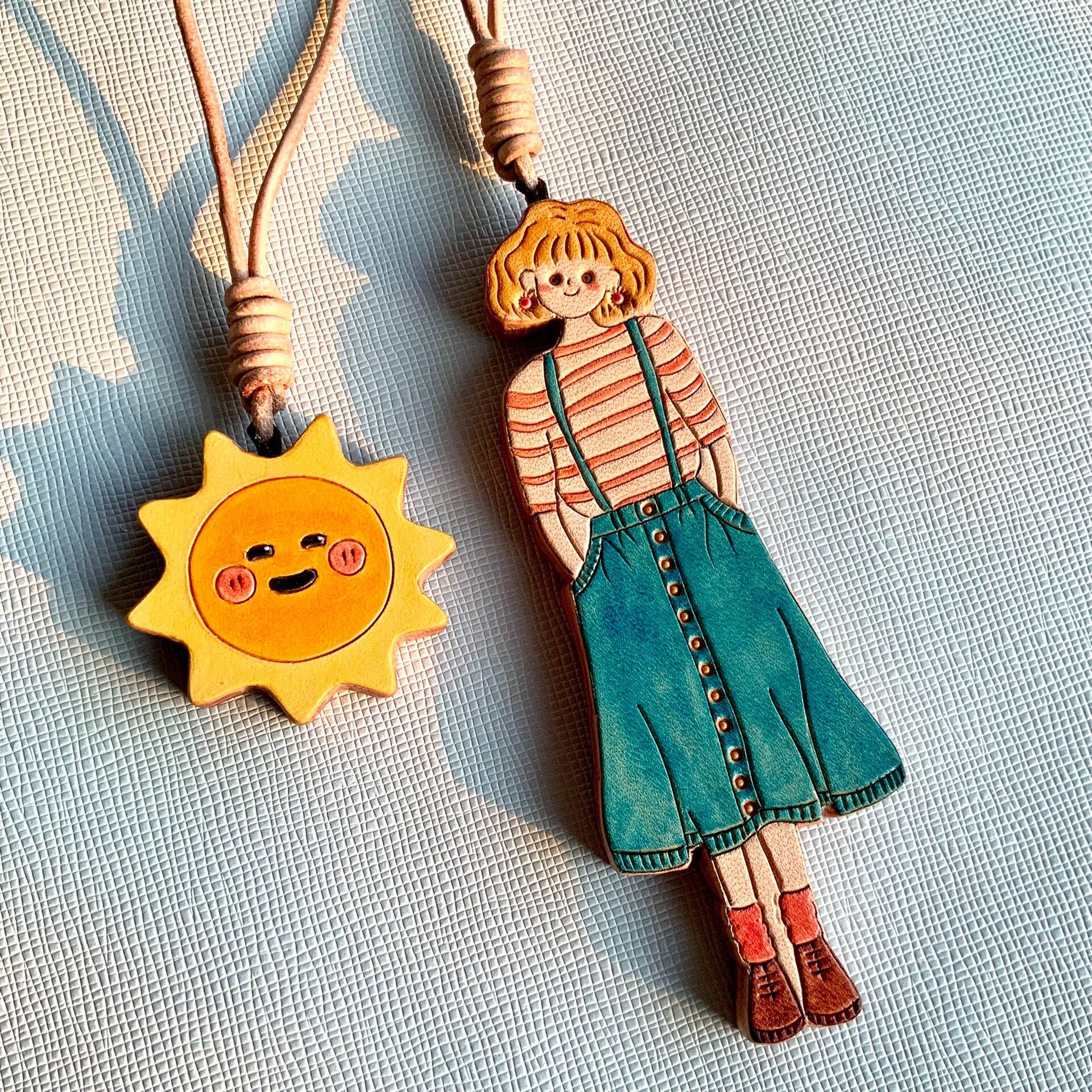 Hand-Painted Leather Girl and Sun Bag Charms