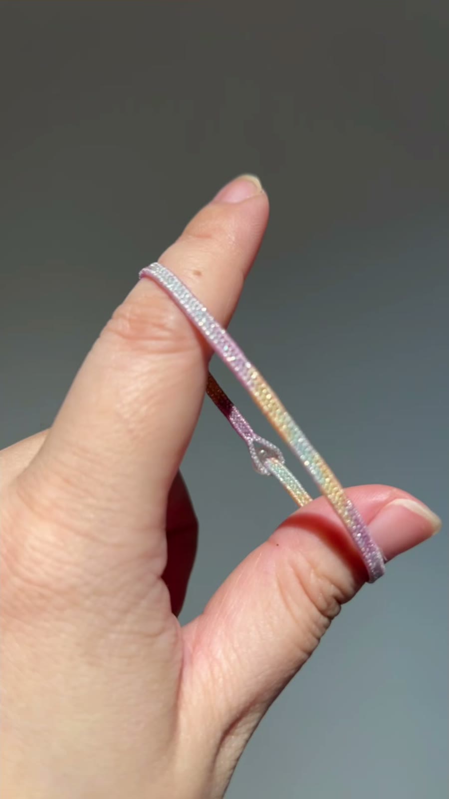 Keerbare armband van space-dyed waskoord