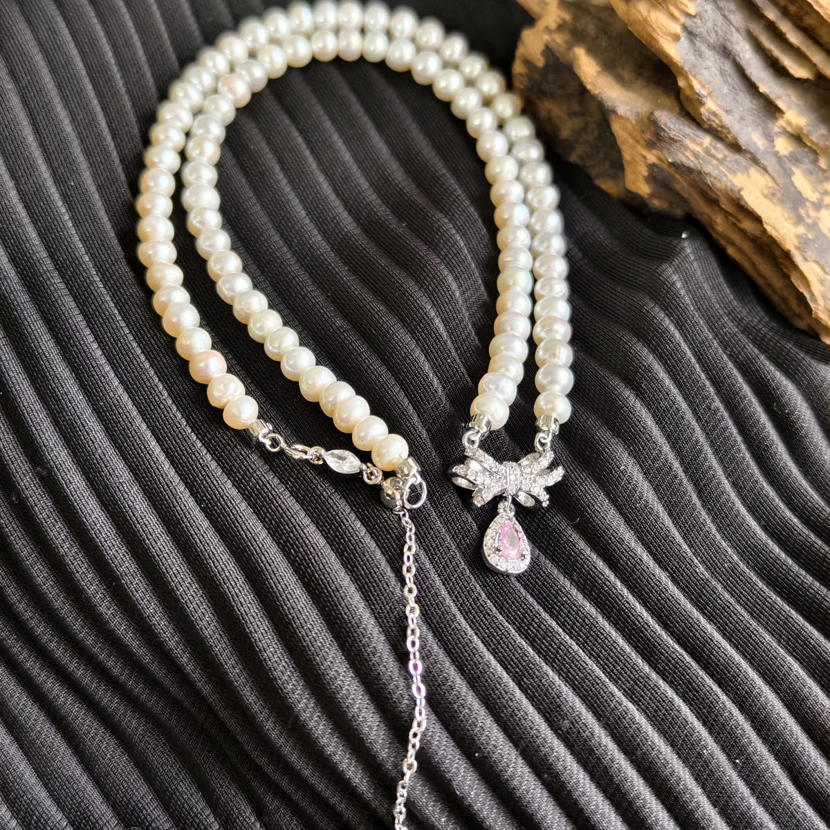 Pearl Necklace with Pink Bow Pendant
