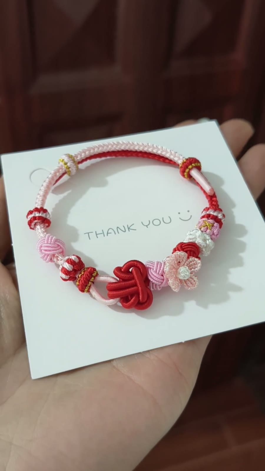 Pulsera de Nudo de Flor Roja y Rosa Trenzada a Mano