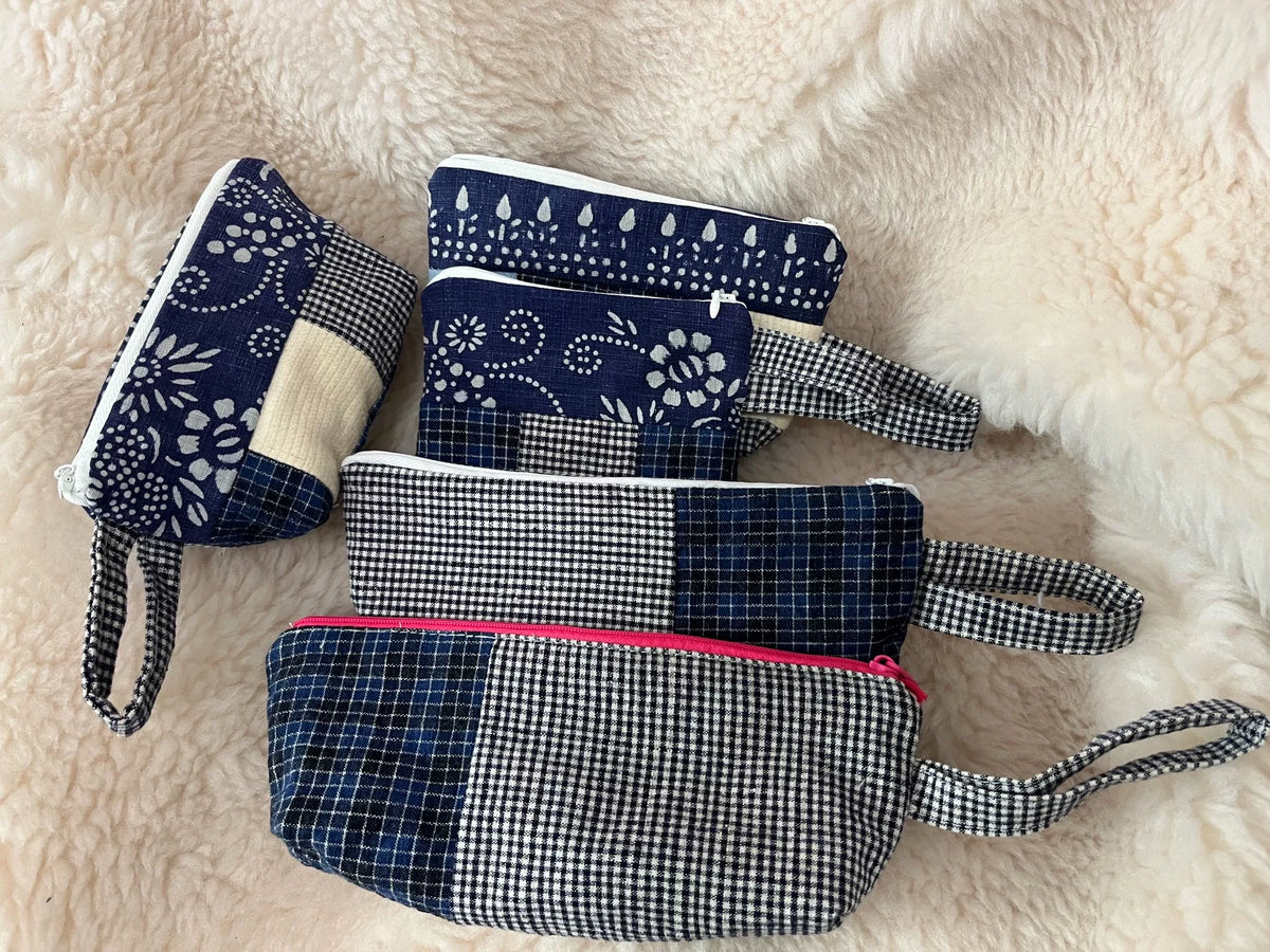 Estuche patchwork con cremallera y correa de muñeca