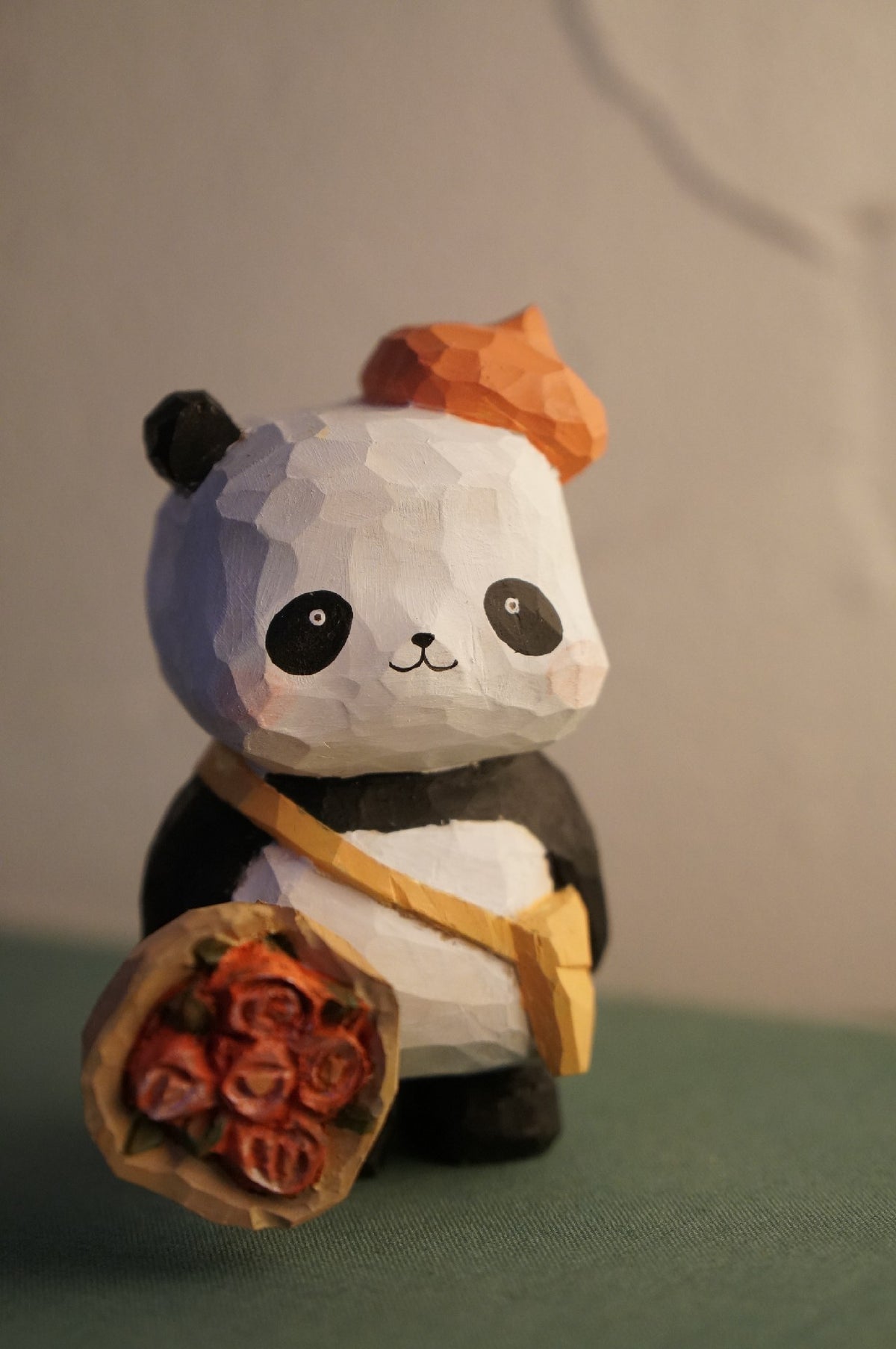 Handcrafted Wooden Panda Sculpture with Flowers