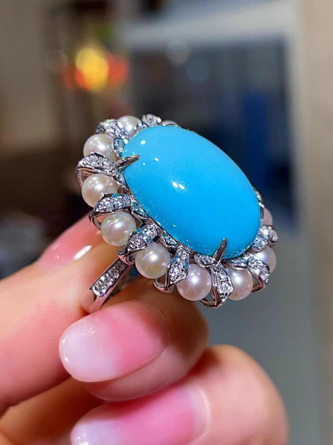 18K Gold Ring with Oval Cabochon Blue Sleeping Beauty Turquoise, Pearl Halo, and Diamond Accents