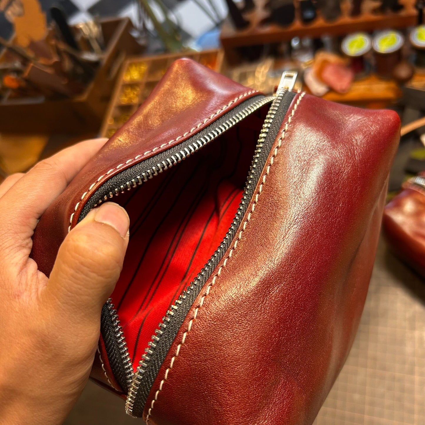 Reddish-Brown Full-Grain Leather Rectangular Pouch with Dual-Zipper Closure