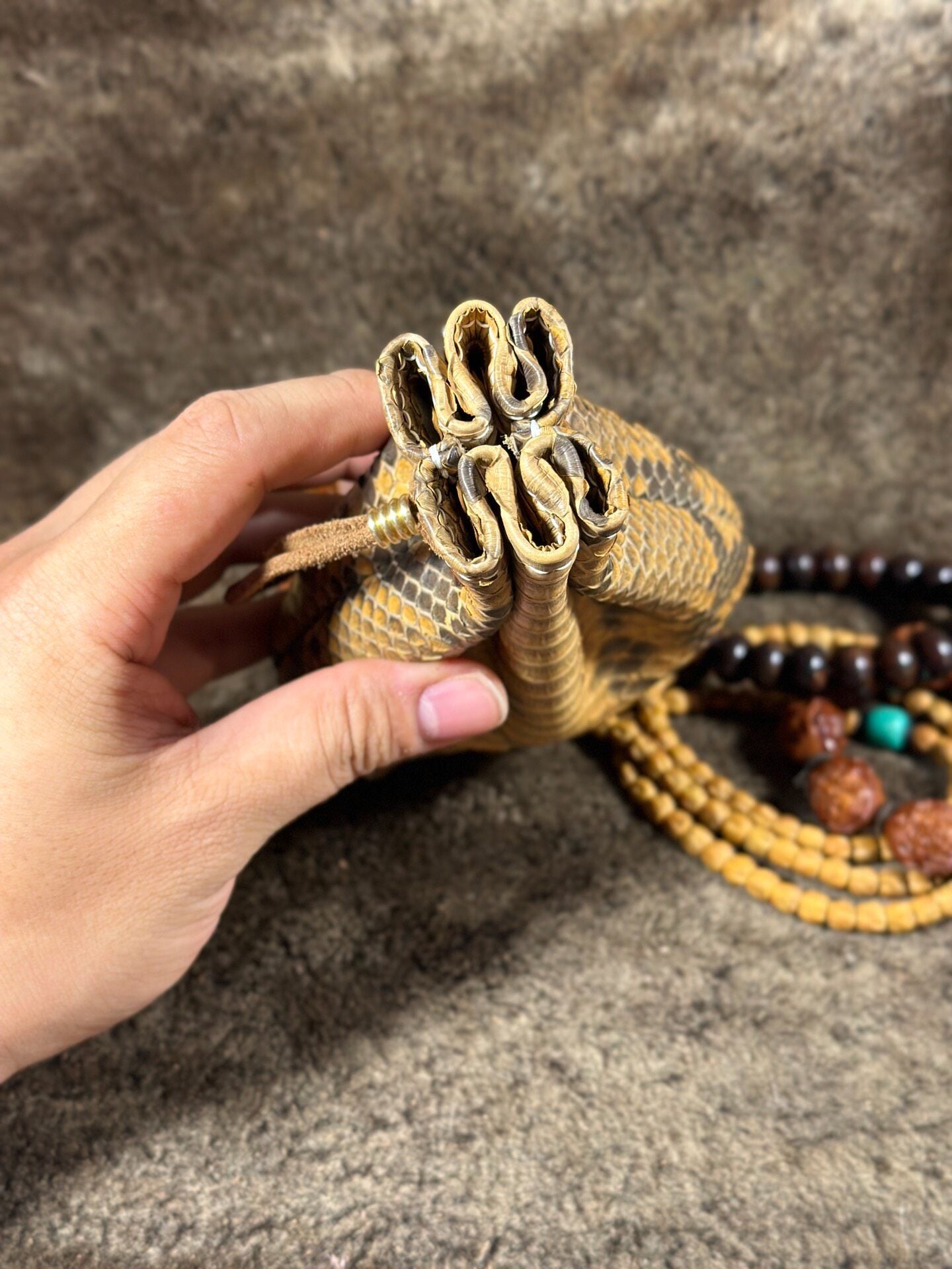 Artisanal Leather Pouch with Dragon Scale Texture and Adjustable Opening