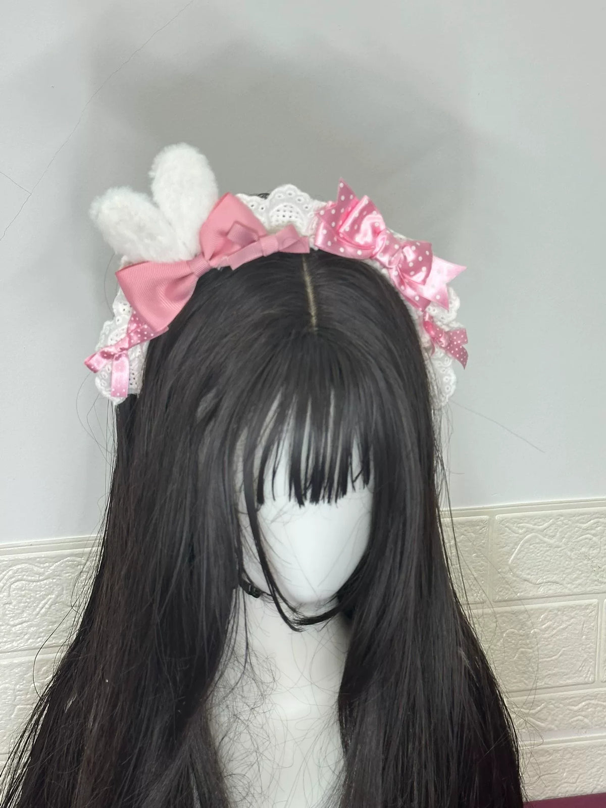 Weißes Plusch-Hasenohr-Hanband mit rosa Schleife