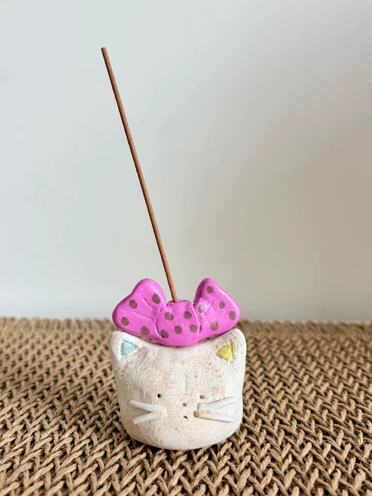 Handmade Clay Cat Figurine with Pink Bow