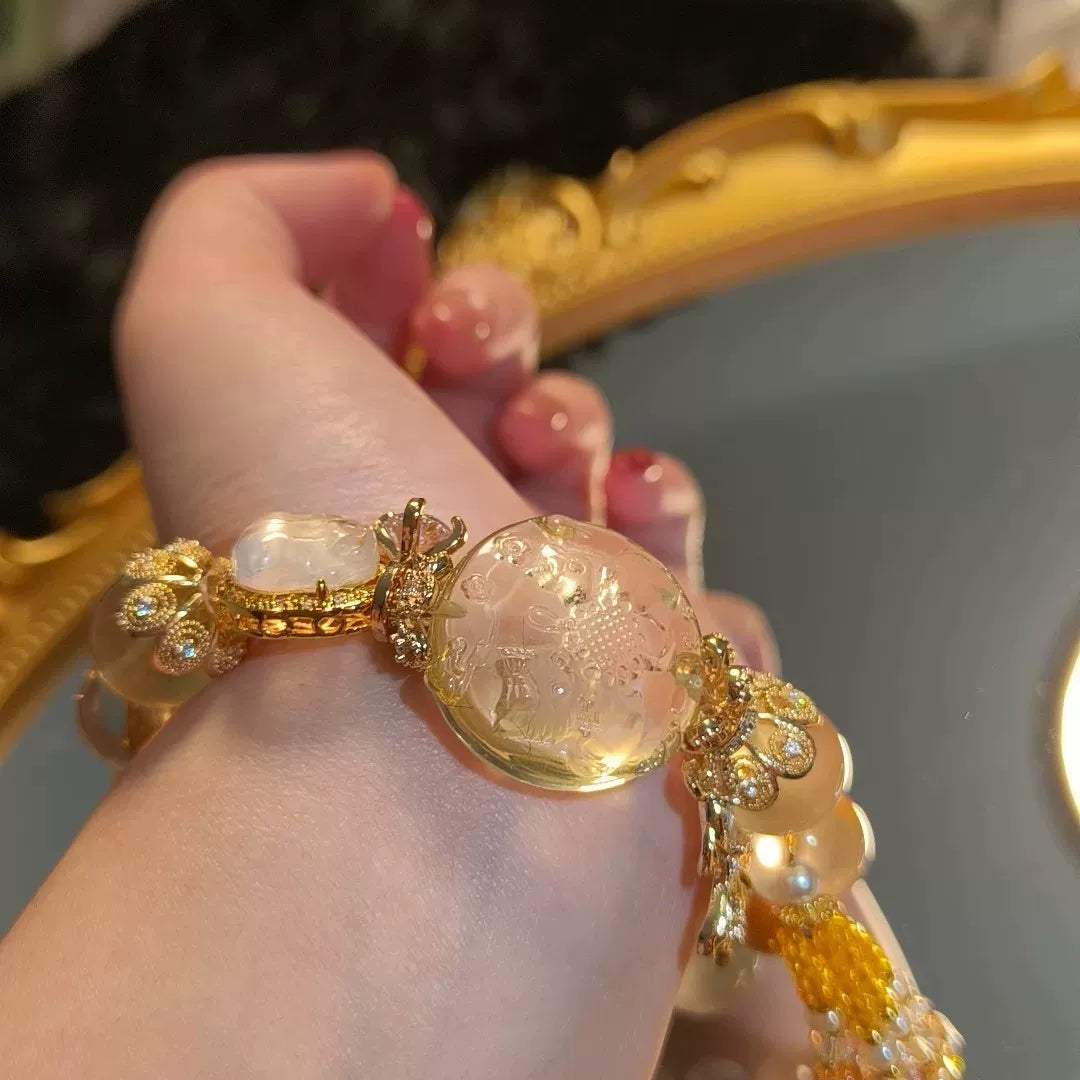 Armband med räv- och enhörningsberlock i gul citrin