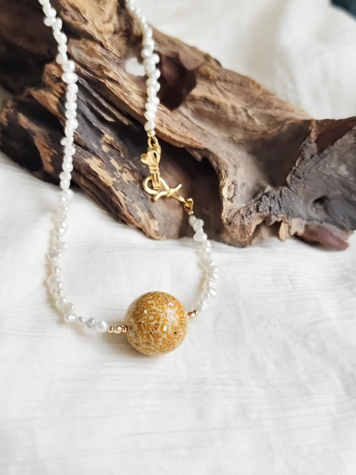 Natural Pearl Necklace with Amber Lacquer Bead